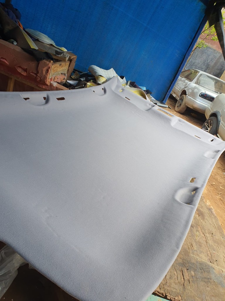 Light grey car headliner roof lining ready for install by Bungoma Seatcovers Ventures