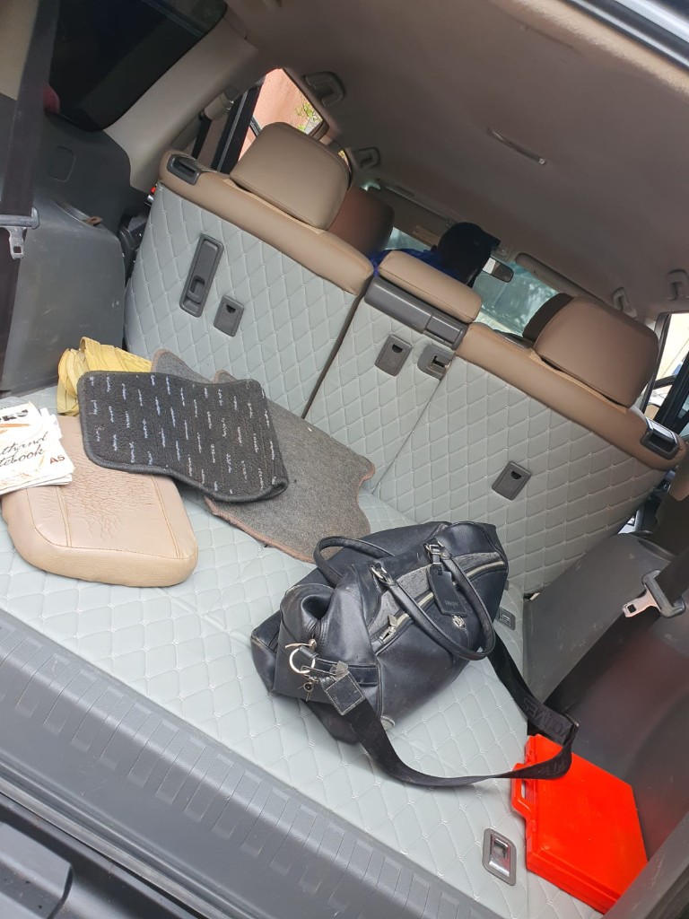 Diamond-quilted grey trunk floor lining and rear seat backs by Bungoma Seatcovers Ventures