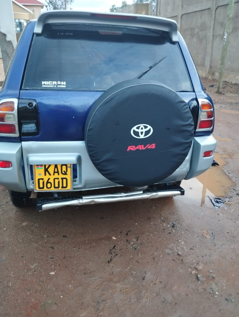 Custom black Toyota RAV4 spare tire cover with logo by Bungoma Seatcovers Ventures