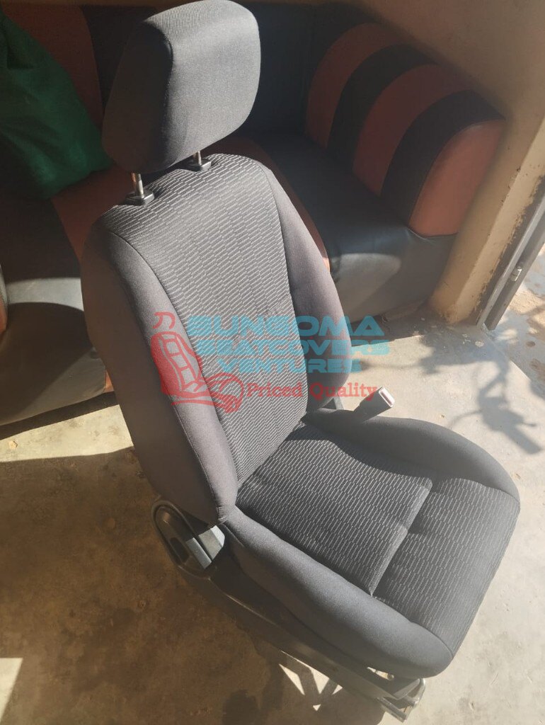 Black ribbed fabric custom car seat cover finished at Bungoma Seatcovers Ventures workshop