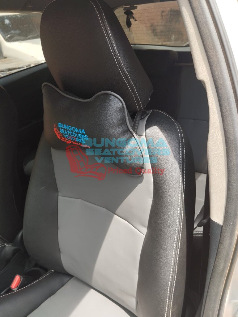 Grey and black custom seat cover with Bungoma Seatcovers Ventures branded neck pillow